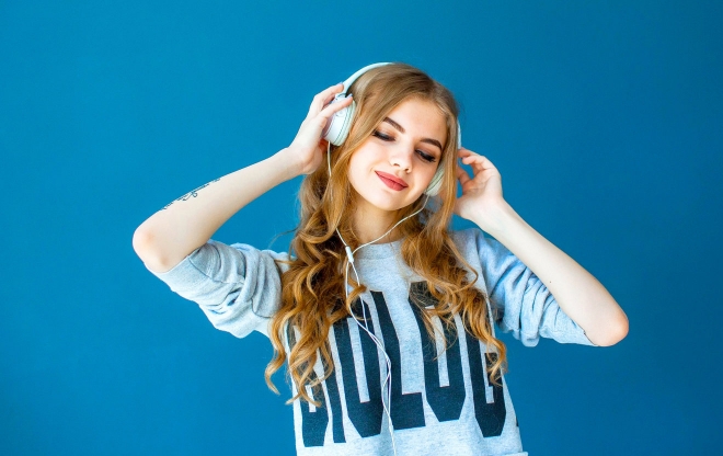 Girl listening on headphones